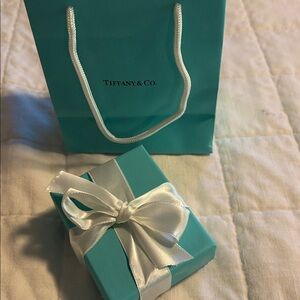 Tiffany & Co. silver knot necklace with original box and bag